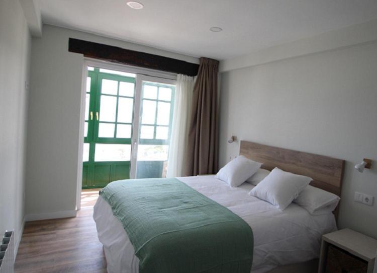 Apartamentos El Muelle コミージャス エクステリア 写真